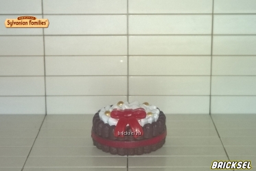Торт с белыми цветами и красным бантом