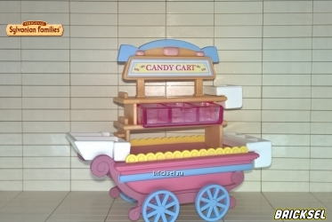 Тележка со сладостями розовая с голубыми колесами с лотками