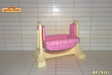 Детская кроватка розовая на бежевой подставке