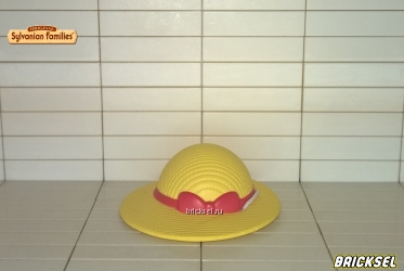 Шляпка с розовой лентой и бантом желтая